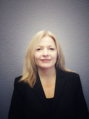 Dr. Christine Baus